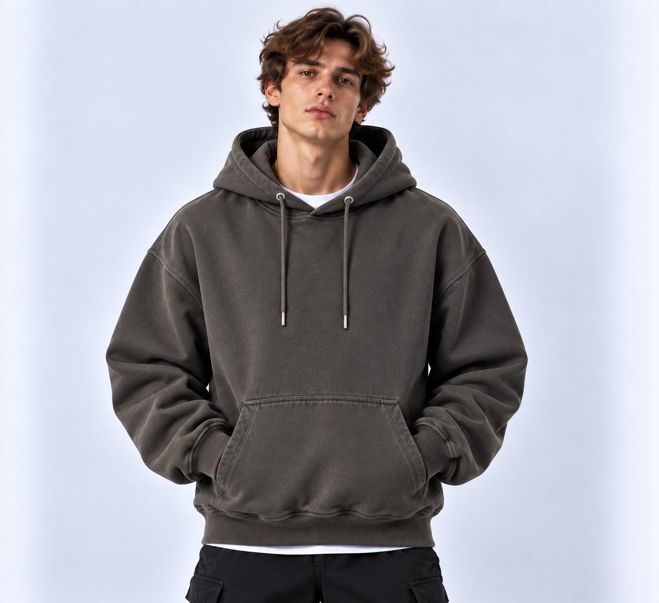 Lifestyle illustration of a brushed fleece hoodie design in charcoal