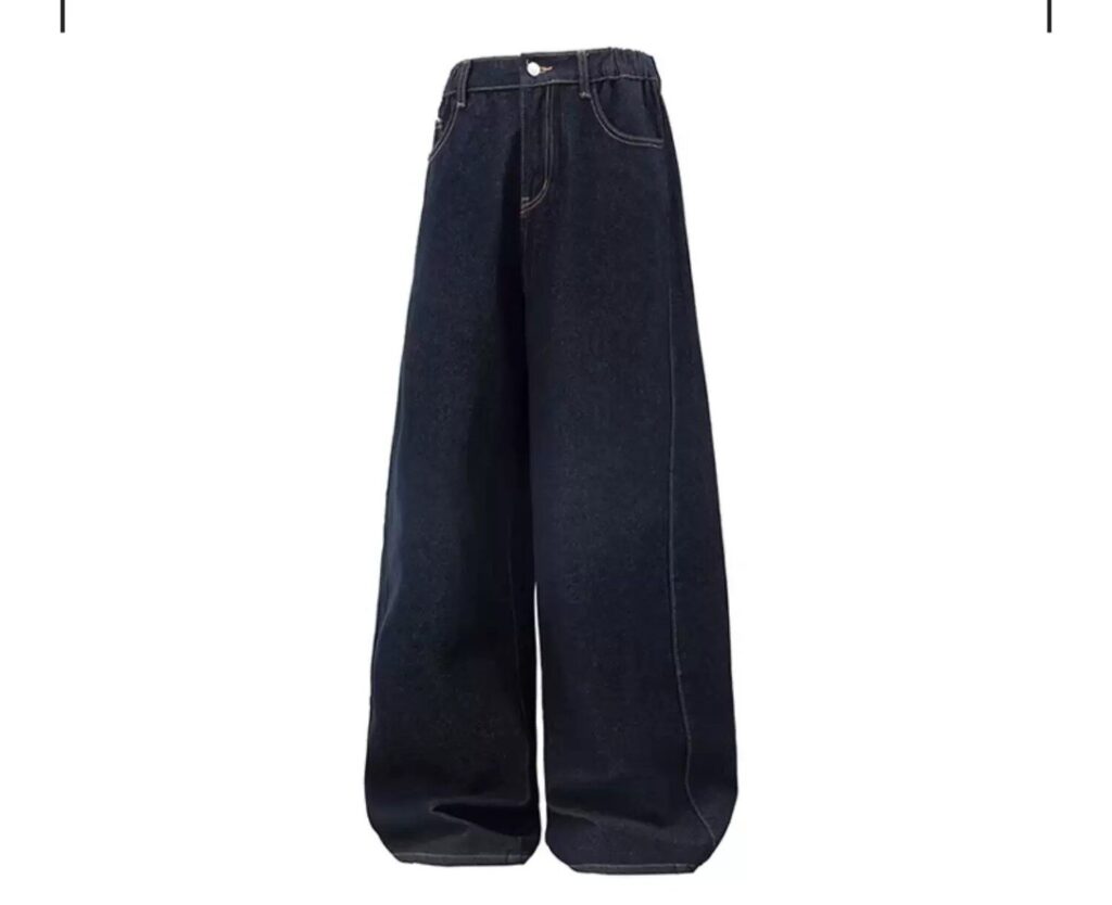 Wide-leg dark indigo jeans, full front view on plain background