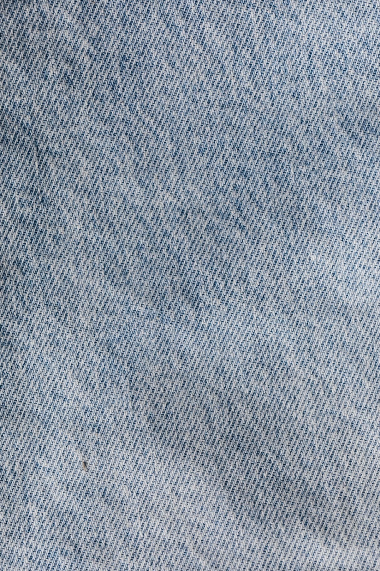 Light blue denim fabric texture close-up