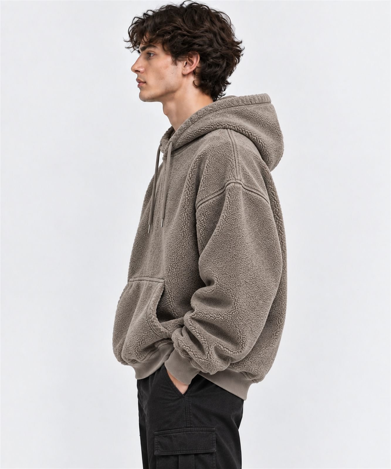 Lifestyle illustration of an oversized fleece hoodie design in taupe