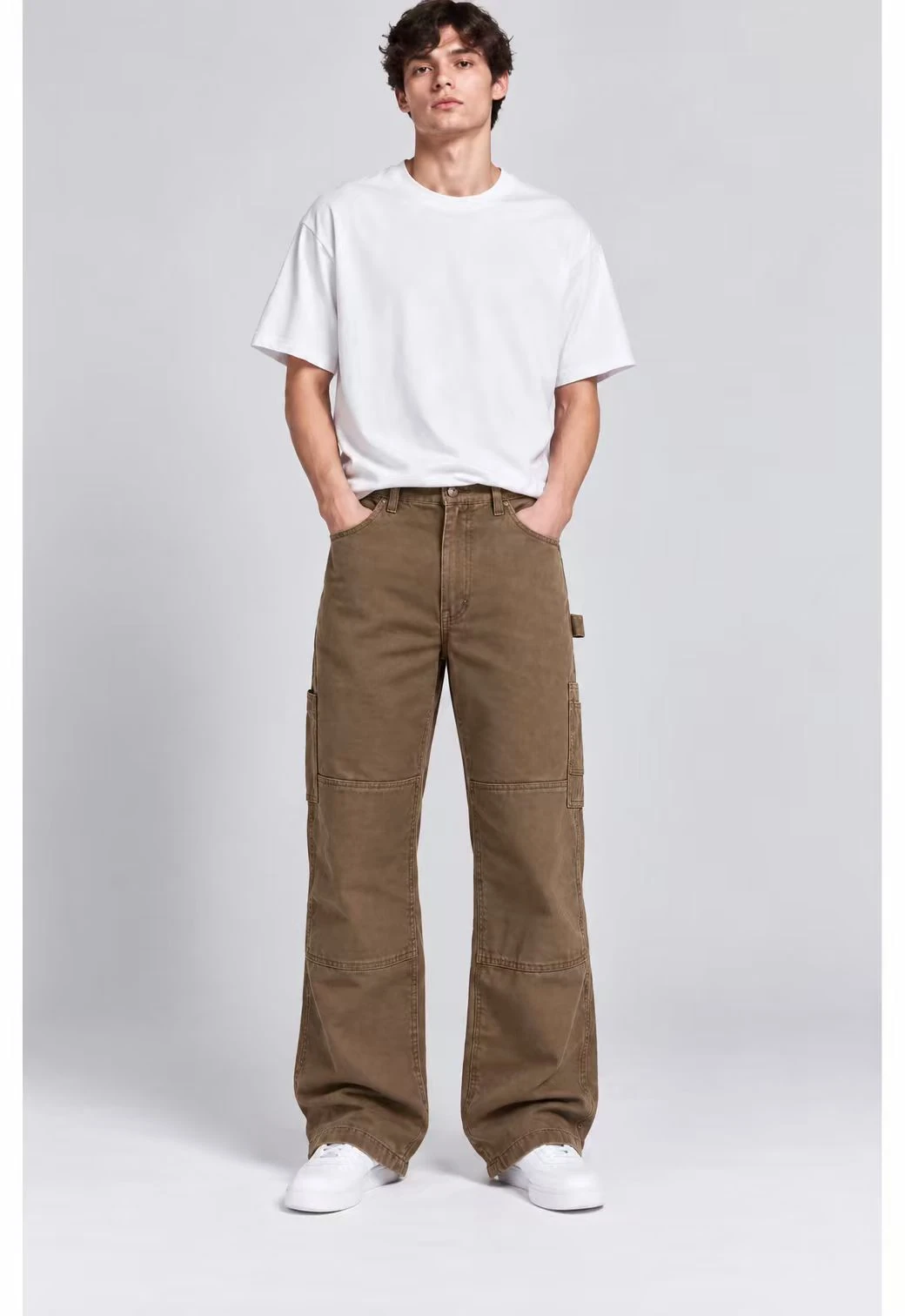 Carpenter Utility Pants worn by a model, front view