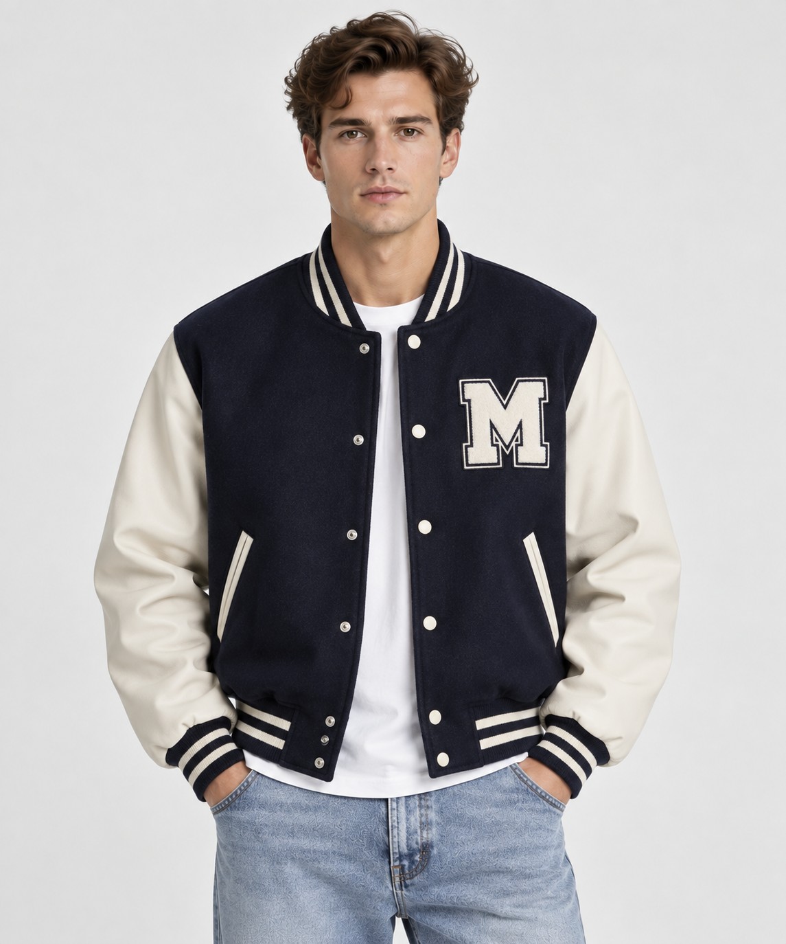 Navy and Cream Letterman Varsity Jacket with Contrast Sleeves and Rib Trim, worn by a male model, front view